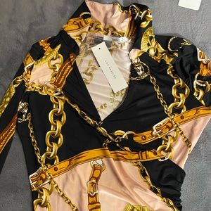 Cute top never worn still has the tags